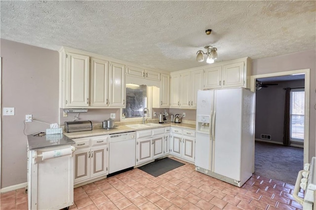744 Hampton Locust Grove Rd, Hampton, GA 30228 - kitchen featuring sink, white appliances, and white cabinetry