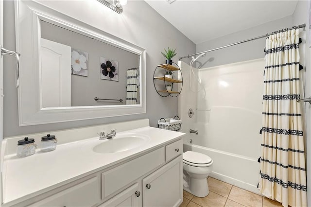 bathroom featuring vanity, tile patterned floors, toilet, and shower / bath combo