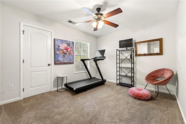 exercise area featuring a ceiling fan, carpet flooring, baseboards, and visible vents