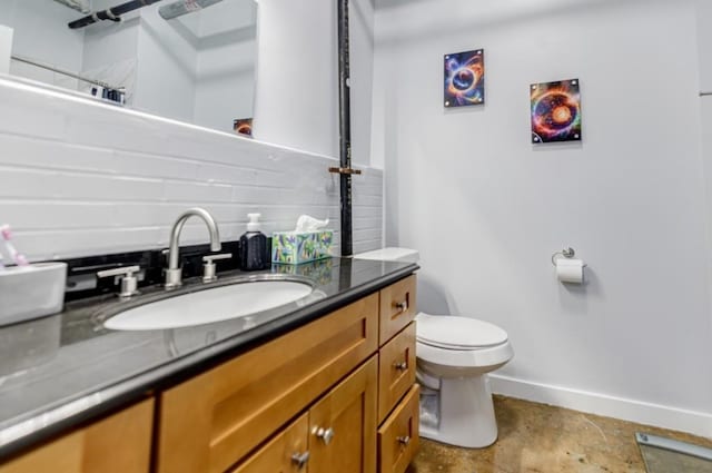 full bath with a shower, toilet, vanity, concrete floors, and baseboards