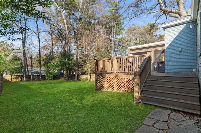 view of yard with a deck