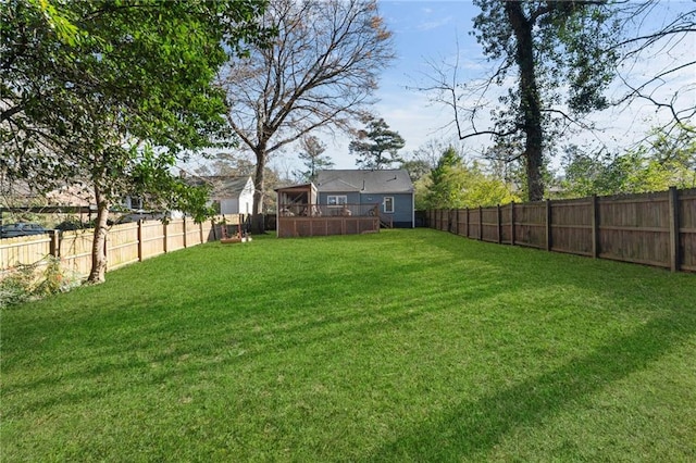 view of yard with a deck