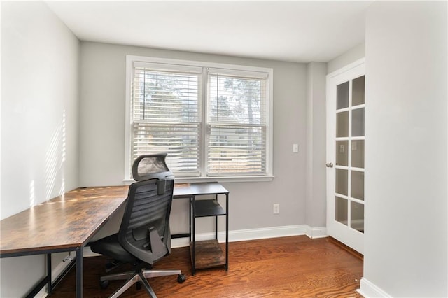 office space with hardwood / wood-style flooring