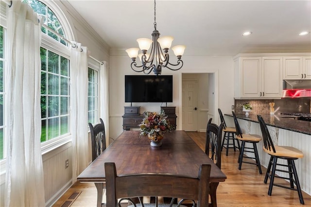 135 Stone Orchard Ct, Milton, GA 30004 - dining room featuring a chandelier, light wood finished floors, ornamental molding, and recessed lighting