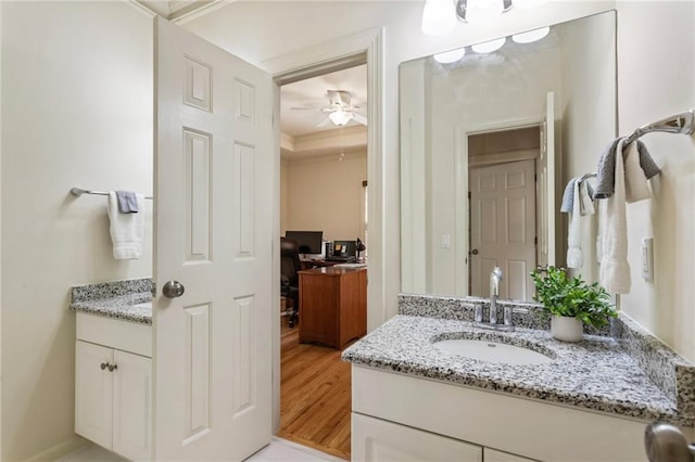 135 Stone Orchard Ct, Milton, GA 30004 - ensuite bathroom featuring two vanities, crown molding, ceiling fan, and wood finished floors