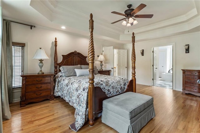 135 Stone Orchard Ct, Milton, GA 30004 - bedroom featuring a raised ceiling, crown molding, light wood-type flooring, ensuite bath, and ceiling fan