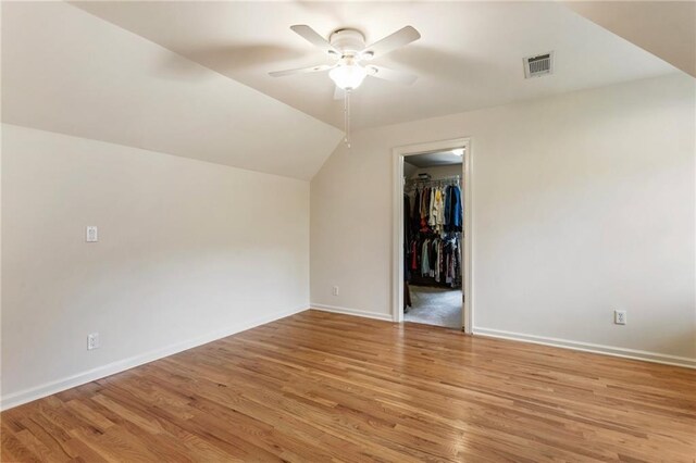135 Stone Orchard Ct, Milton, GA 30004 - additional living space featuring ceiling fan, light wood-type flooring, baseboards, and lofted ceiling