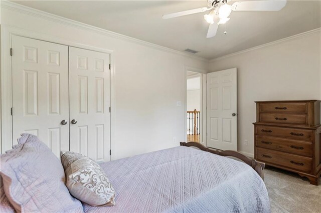 135 Stone Orchard Ct, Milton, GA 30004 - bedroom featuring light colored carpet, a closet, crown molding, and ceiling fan