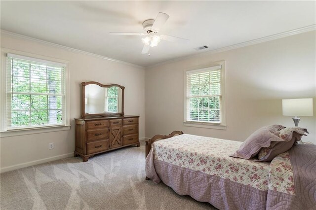 135 Stone Orchard Ct, Milton, GA 30004 - bedroom featuring multiple windows, ornamental molding, baseboards, light carpet, and a ceiling fan