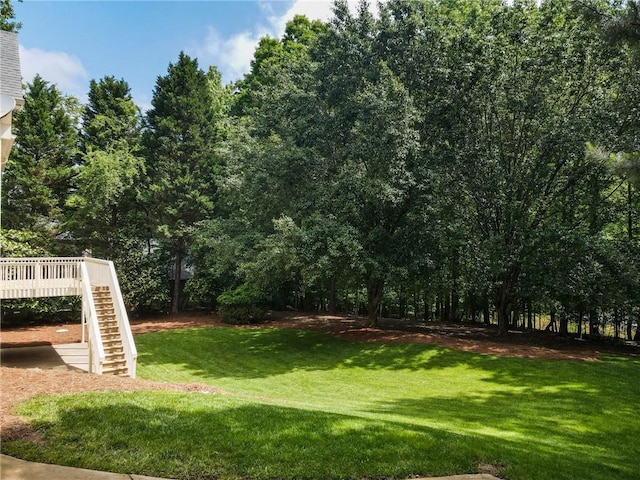 135 Stone Orchard Ct, Milton, GA 30004 - view of grassy yard with stairway and a deck