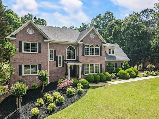 135 Stone Orchard Ct, Milton, GA 30004 - view of front of home with brick siding and a front yard