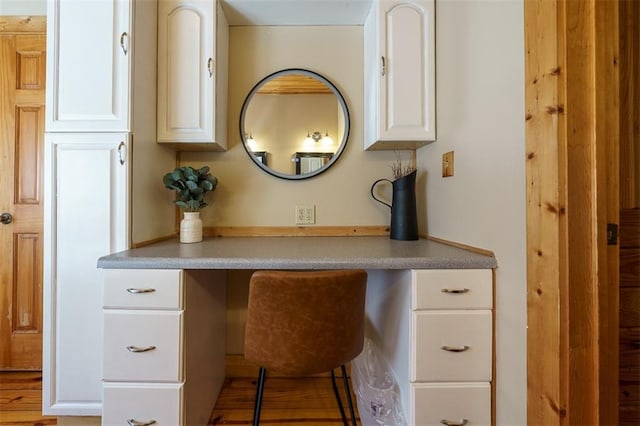 interior space featuring built in desk