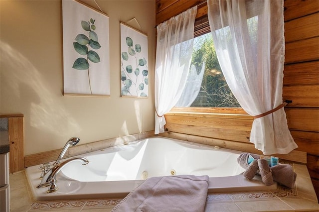 bathroom featuring tiled bath