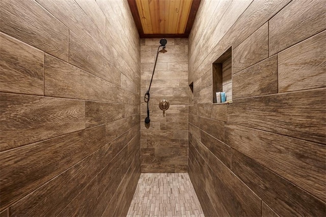 room details with a tile shower