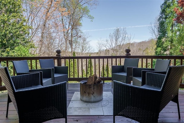 wooden terrace featuring outdoor lounge area