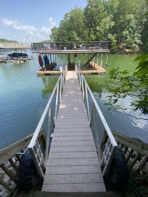 view of dock with a water view
