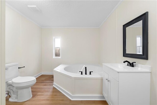 32 Brent Cir SW, Cartersville, GA 30120 - bathroom featuring vanity, wood finished floors, toilet, a textured ceiling, and a bath