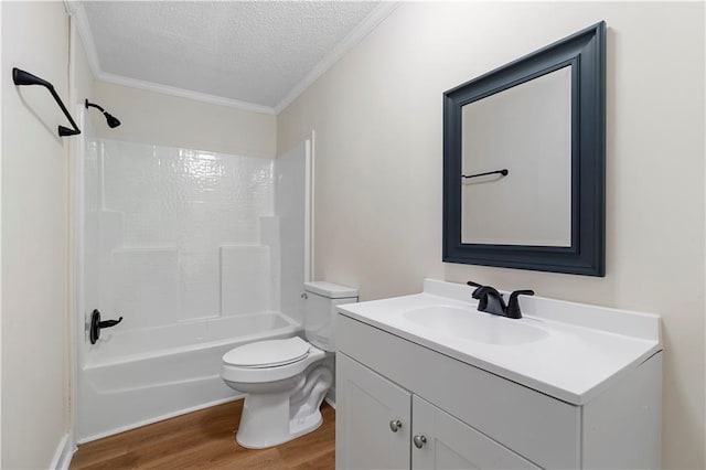 32 Brent Cir SW, Cartersville, GA 30120 - bathroom with crown molding, toilet, vanity, wood finished floors, and a textured ceiling