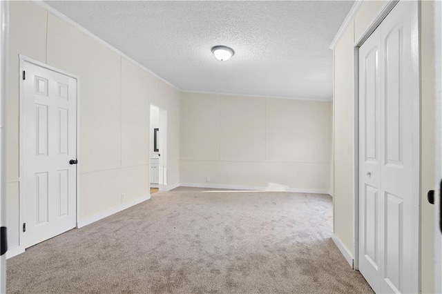 32 Brent Cir SW, Cartersville, GA 30120 - spare room with crown molding, carpet flooring, and a textured ceiling