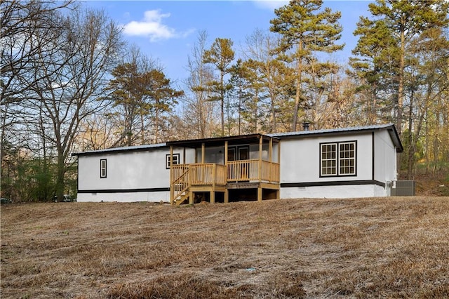 32 Brent Cir SW, Cartersville, GA 30120 - manufactured / mobile home with crawl space, cooling unit, and a wooden deck