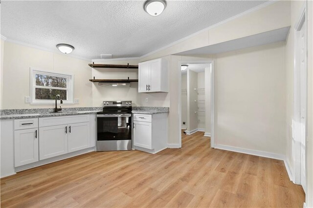 32 Brent Cir SW, Cartersville, GA 30120 - kitchen with light wood finished floors, a sink, ornamental molding, stainless steel range with electric cooktop, and a textured ceiling