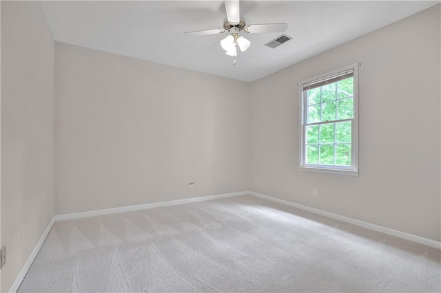 3320 Woodleaf Way, Marietta, GA 30062 - spare room featuring light carpet, baseboards, and a ceiling fan