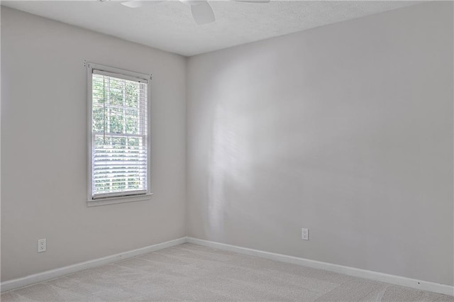 3320 Woodleaf Way, Marietta, GA 30062 - empty room with a ceiling fan, carpet flooring, baseboards, and a textured ceiling