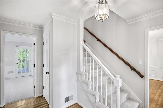 3320 Woodleaf Way, Marietta, GA 30062 - stairs with wood finished floors, crown molding, a chandelier, and baseboards