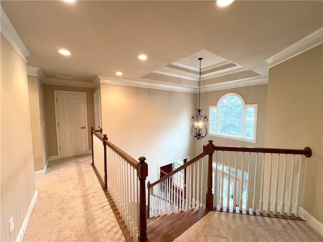 unfurnished dining area featuring a chandelier, hardwood / wood-style flooring, and crown molding