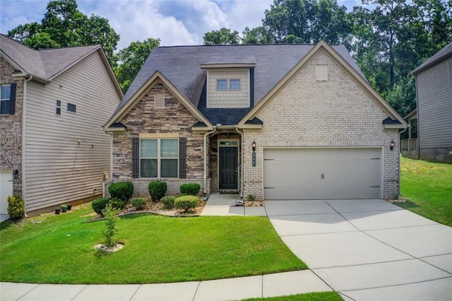 555 Lance View Ln, Lawrenceville, GA 30045 - craftsman-style house with driveway, an attached garage, a front yard, and brick siding