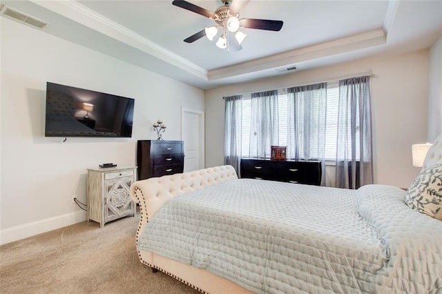 555 Lance View Ln, Lawrenceville, GA 30045 - bedroom with a raised ceiling, baseboards, crown molding, light carpet, and ceiling fan