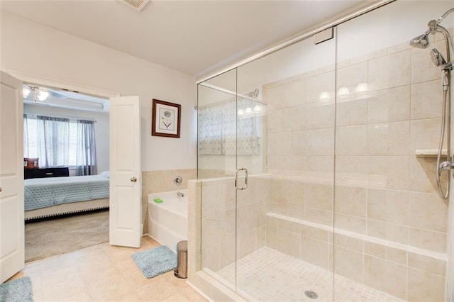 555 Lance View Ln, Lawrenceville, GA 30045 - ensuite bathroom featuring a garden tub, a stall shower, and tile patterned floors