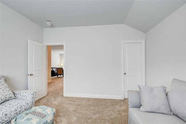 555 Lance View Ln, Lawrenceville, GA 30045 - living area featuring light carpet, vaulted ceiling, and baseboards