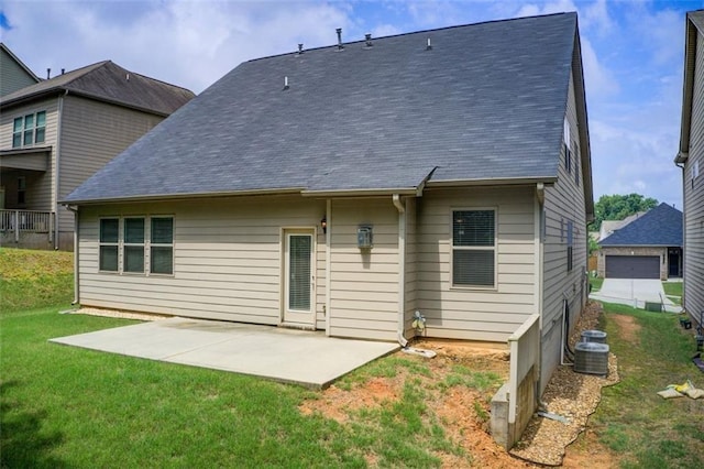 555 Lance View Ln, Lawrenceville, GA 30045 - back of property with a patio, a lawn, and a shingled roof