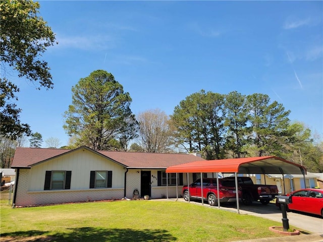 ranch-style home featuring a front lawn, a carport, roof with shingles, and brick siding