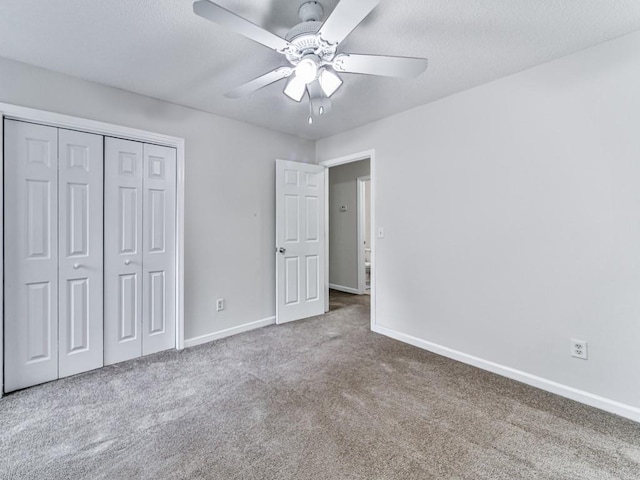 20 Preserve Dr, Newnan, GA 30263 - unfurnished bedroom featuring carpet floors, a closet, a textured ceiling, and ceiling fan