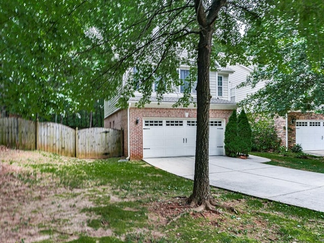 20 Preserve Dr, Newnan, GA 30263 - view of side of home featuring driveway, a garage, and brick siding