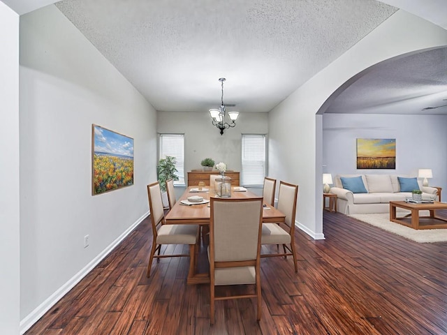 20 Preserve Dr, Newnan, GA 30263 - dining space with a textured ceiling, arched walkways, a chandelier, and wood finished floors