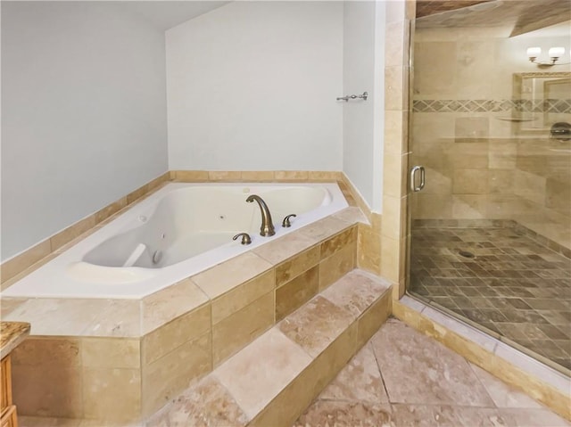 bathroom with independent shower and bath and vanity