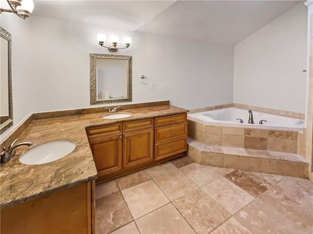 bathroom with tile patterned flooring, tiled tub, and vanity