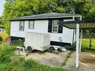 151 N Church St, Buford, GA 30518 - back of property featuring a carport