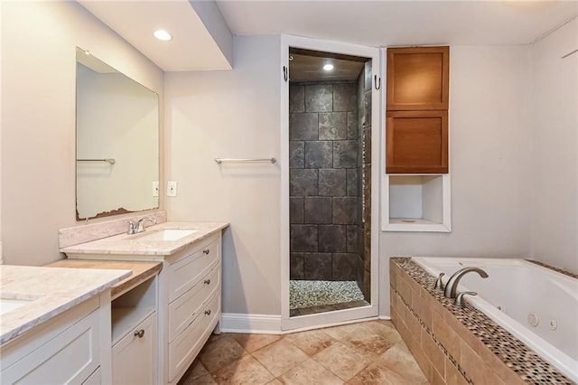 bathroom with separate shower and tub and vanity