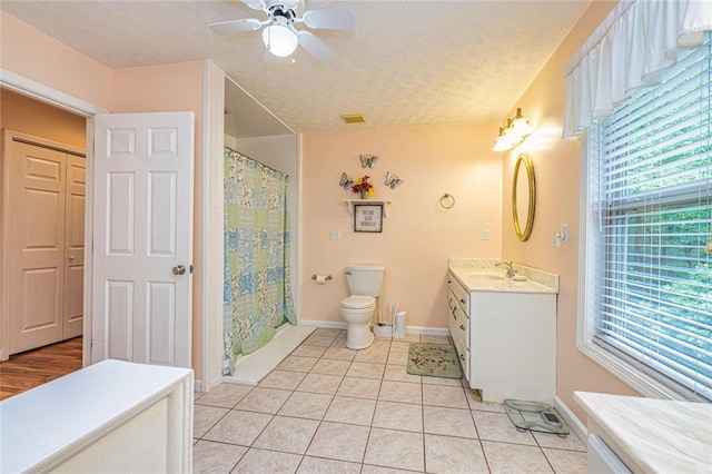 130 Brooklet Way, Brooks, GA 30205 - full bathroom with a textured ceiling, vanity, a ceiling fan, tile patterned flooring, and a shower with curtain