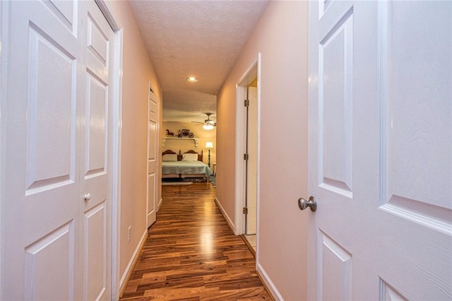 130 Brooklet Way, Brooks, GA 30205 - hallway with wood finished floors, a textured ceiling, and recessed lighting