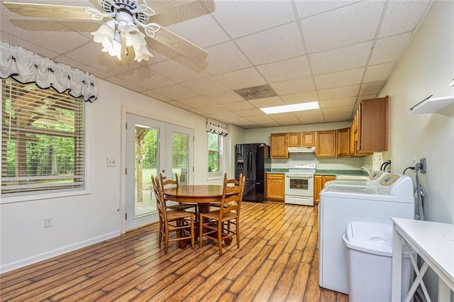 130 Brooklet Way, Brooks, GA 30205 - dining room featuring independent washer and dryer, light wood finished floors, french doors, a drop ceiling, and ceiling fan