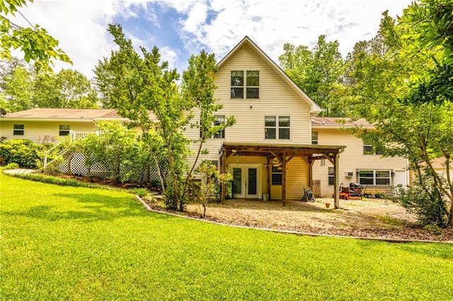 130 Brooklet Way, Brooks, GA 30205 - rear view of house featuring french doors, a lawn, and a patio area