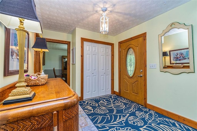 130 Brooklet Way, Brooks, GA 30205 - entryway featuring a textured ceiling and baseboards
