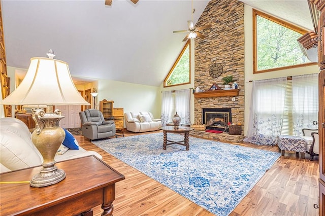 130 Brooklet Way, Brooks, GA 30205 - living room with ceiling fan, high vaulted ceiling, a fireplace, and wood finished floors