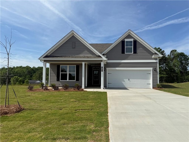 96 Sherwood Dr, Commerce, GA 30529 - craftsman house featuring a front lawn, driveway, and a garage