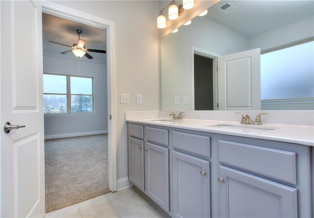 96 Sherwood Dr, Commerce, GA 30529 - full bathroom with double vanity, visible vents, a ceiling fan, and a sink